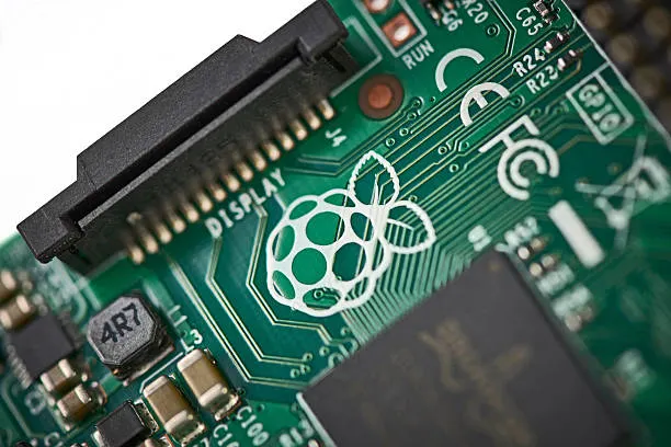 Close-up of a Raspberry Pi circuit board with the Raspberry Pi logo